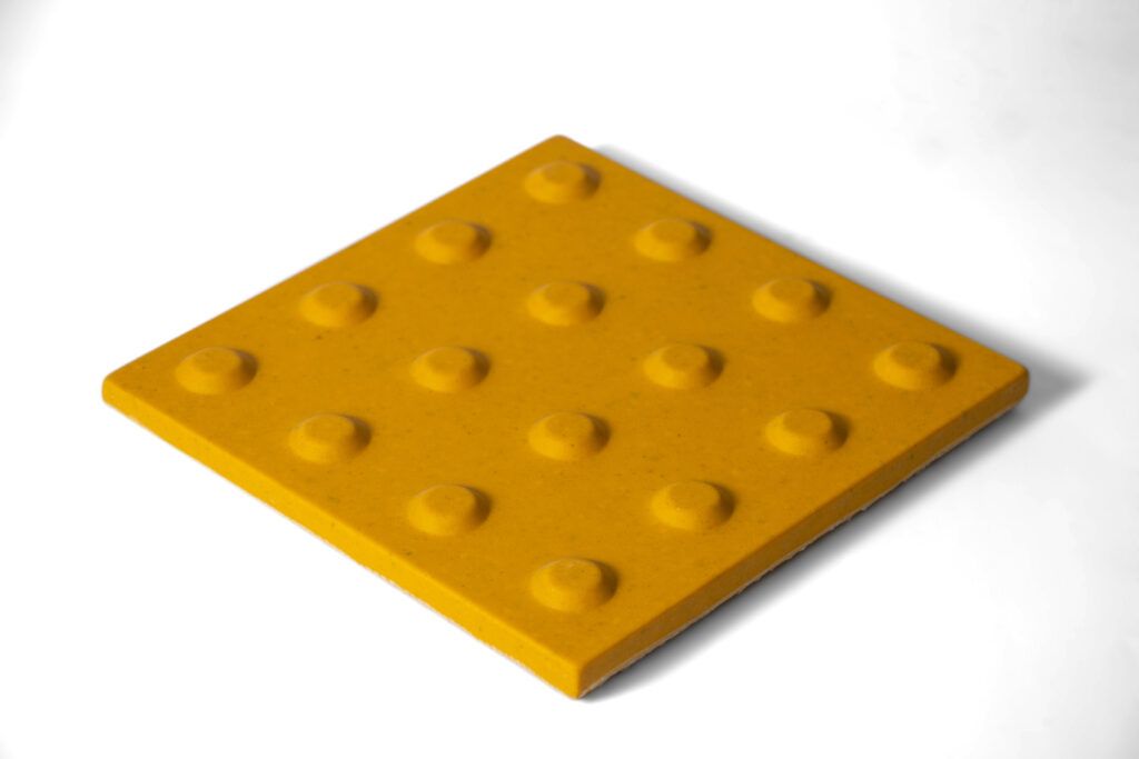 gu-a-podot-ctil-de-concreto-polim-rico-en-puntos-20x20cm